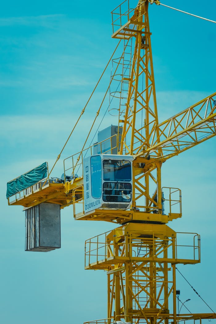 Yellow Crane Under a Blue Sky